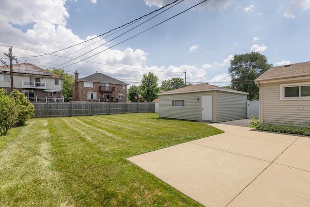 8255 Lockwood Ave, Burbank, IL 60459 - view of yard featuring a patio and an outbuilding