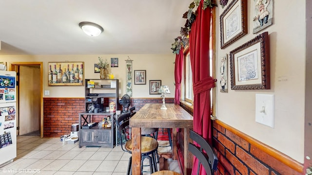 8824 Cherry Ave, River Grove, IL 60171 - dining area with a wainscoted wall and light tile patterned floors
