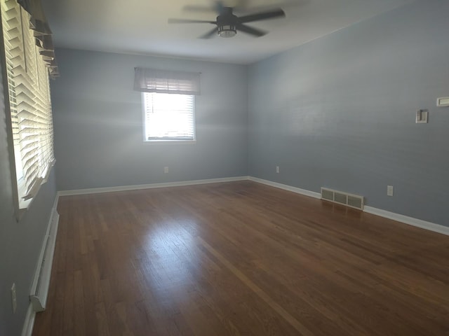 406 Highland St, Belvidere, IL 61008 - unfurnished room with ceiling fan and dark wood finished floors