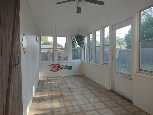 406 Highland St, Belvidere, IL 61008 - unfurnished sunroom with tile patterned floors and healthy amount of natural light
