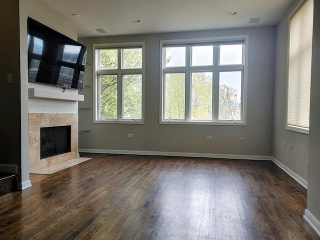 331 E 17th St, Chicago, IL 60616 - unfurnished living room featuring dark wood finished floors and a fireplace