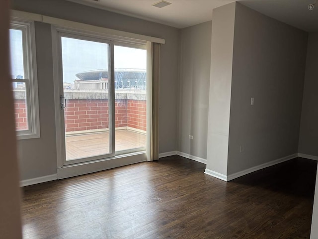331 E 17th St, Chicago, IL 60616 - spare room with dark wood finished floors