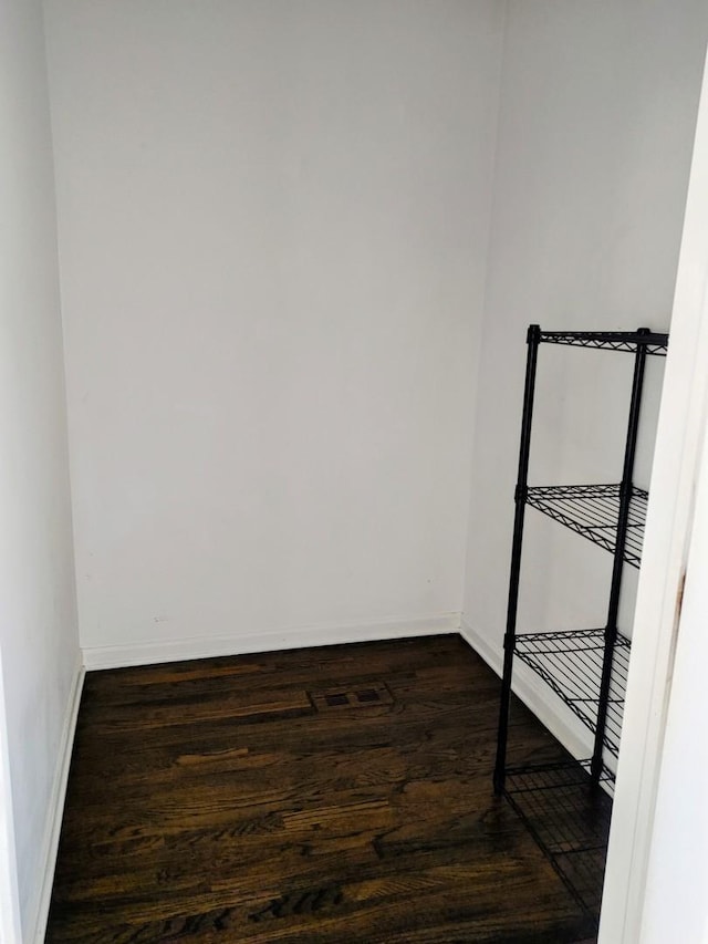 331 E 17th St, Chicago, IL 60616 - unfurnished room featuring dark wood-type flooring and baseboards
