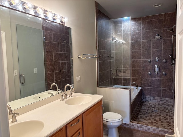 331 E 17th St, Chicago, IL 60616 - bathroom with a tile shower, double vanity, and tile patterned flooring