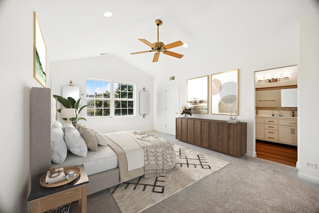 2566 Camberley Cir, Westchester, IL 60154 - bedroom with lofted ceiling, light carpet, ensuite bathroom, and a ceiling fan