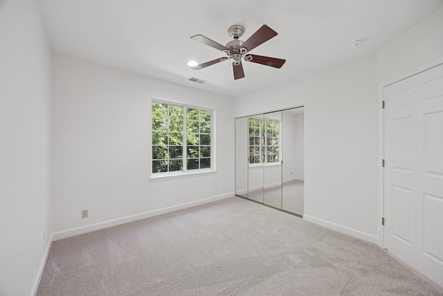 2566 Camberley Cir, Westchester, IL 60154 - unfurnished bedroom with carpet floors, a ceiling fan, and a closet