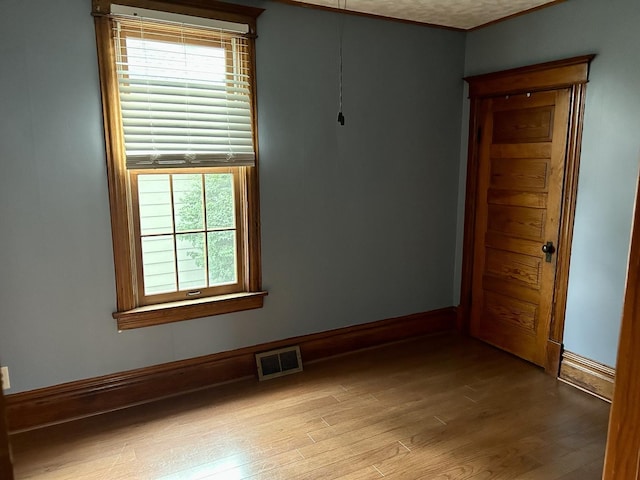 109 E Minnesota St, Spring Valley, IL 61362 - unfurnished room featuring wood finished floors and ornamental molding