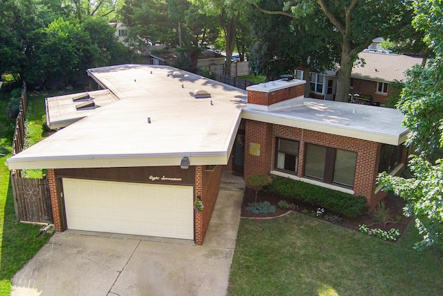 817 Meadow Ln, Sycamore, IL 60178 - ranch-style home with brick siding, concrete driveway, a garage, and a front lawn