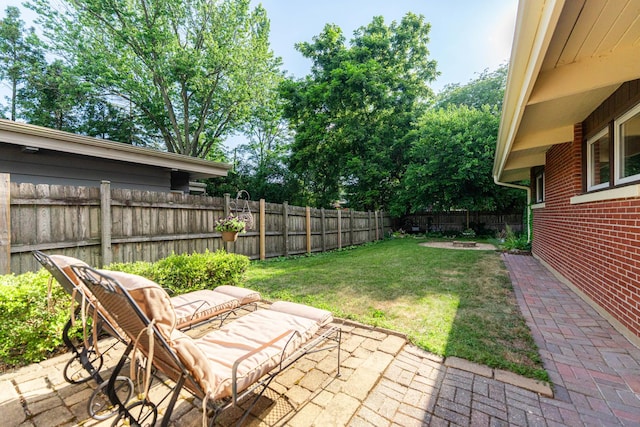 817 Meadow Ln, Sycamore, IL 60178 - fenced backyard featuring a patio area