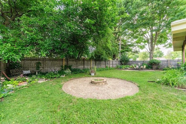 817 Meadow Ln, Sycamore, IL 60178 - fenced backyard with a fire pit