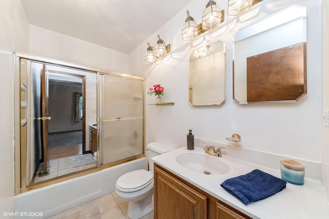 7400 Nantucket Cv, Hanover Park, IL 60133 - full bathroom with vanity, enclosed tub / shower combo, and tile patterned floors