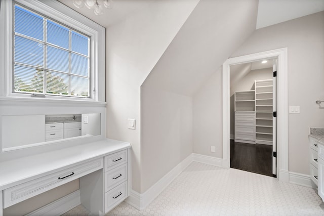 6403 S Garfield Ave, Burr Ridge, IL 60527 - unfurnished office featuring vaulted ceiling and baseboards