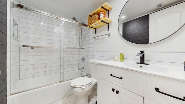 11104 O Gorman Dr Unit 41B, Palos Hills, IL 60465 - bathroom with tile walls, vanity, combined bath / shower with glass door, and tile patterned flooring