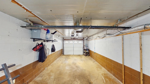 11104 O Gorman Dr Unit 41B, Palos Hills, IL 60465 - garage featuring concrete block wall and a garage door opener