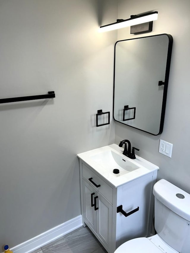 1224 S Harding Ave, Chicago, IL 60623 - bathroom featuring toilet and vanity