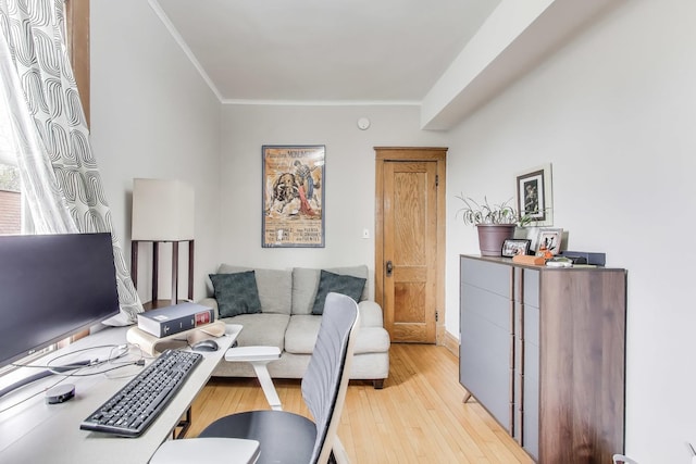 2333 N Spaulding Ave, Chicago, IL 60647 - living area with crown molding, light wood-style flooring, and a desk