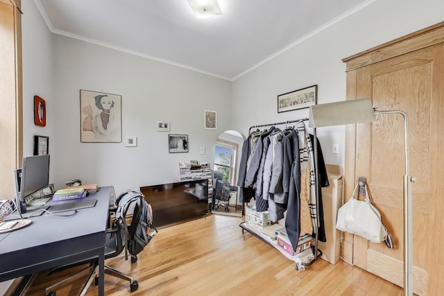 2333 N Spaulding Ave, Chicago, IL 60647 - office area with light wood-type flooring, crown molding, and arched walkways