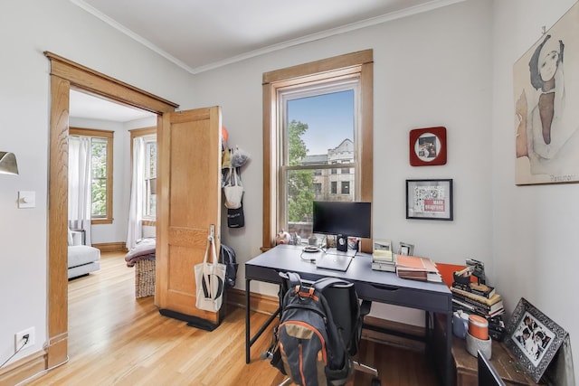 2333 N Spaulding Ave, Chicago, IL 60647 - home office with light wood-style floors and crown molding
