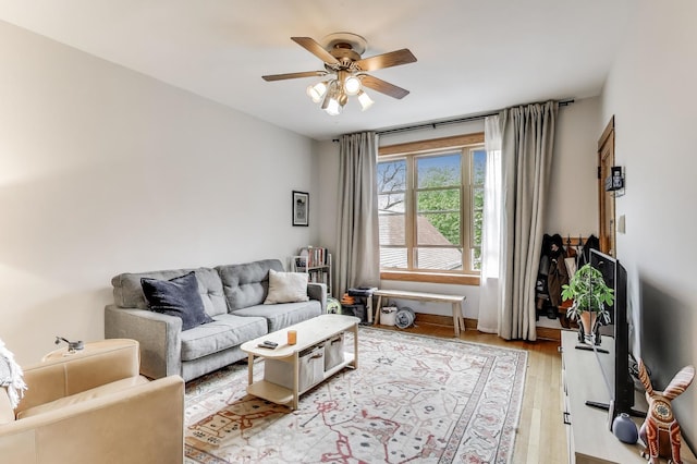 2333 N Spaulding Ave, Chicago, IL 60647 - living room with a ceiling fan and light wood-type flooring