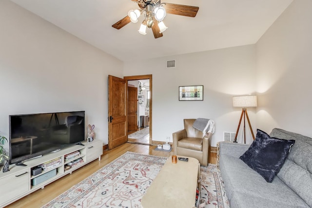 2333 N Spaulding Ave, Chicago, IL 60647 - living area with a ceiling fan and light wood-type flooring