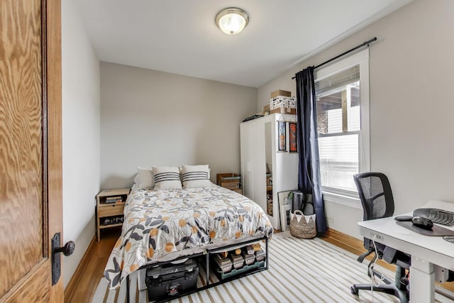 2333 N Spaulding Ave, Chicago, IL 60647 - bedroom with wood finished floors and a desk