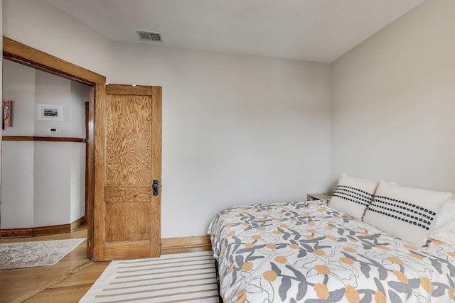 2333 N Spaulding Ave, Chicago, IL 60647 - bedroom featuring light wood-style flooring