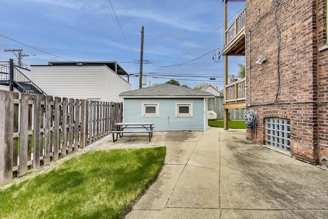 2333 N Spaulding Ave, Chicago, IL 60647 - view of yard featuring a patio, a balcony, and an outbuilding