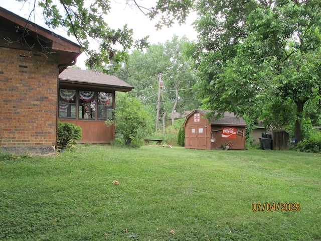 15521 116th Ct, Orland Park, IL 60467 - view of grassy yard featuring a storage unit and a sunroom