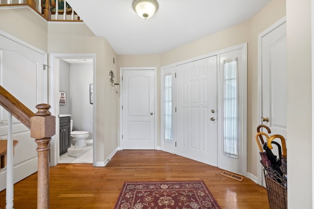 700 Monroe Dr, Lindenhurst, IL 60046 - entryway featuring wood finished floors and healthy amount of natural light