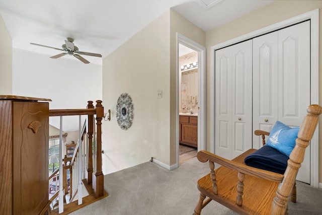 700 Monroe Dr, Lindenhurst, IL 60046 - living area with an upstairs landing, light carpet, and a ceiling fan