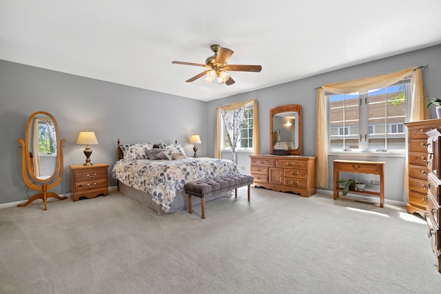 700 Monroe Dr, Lindenhurst, IL 60046 - carpeted bedroom featuring multiple windows and ceiling fan