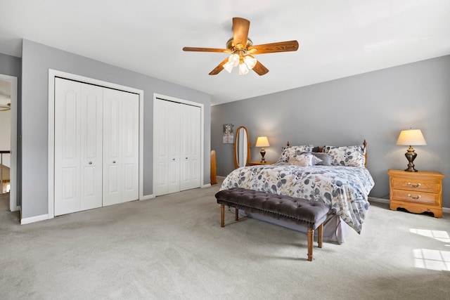 700 Monroe Dr, Lindenhurst, IL 60046 - carpeted bedroom with multiple closets and ceiling fan