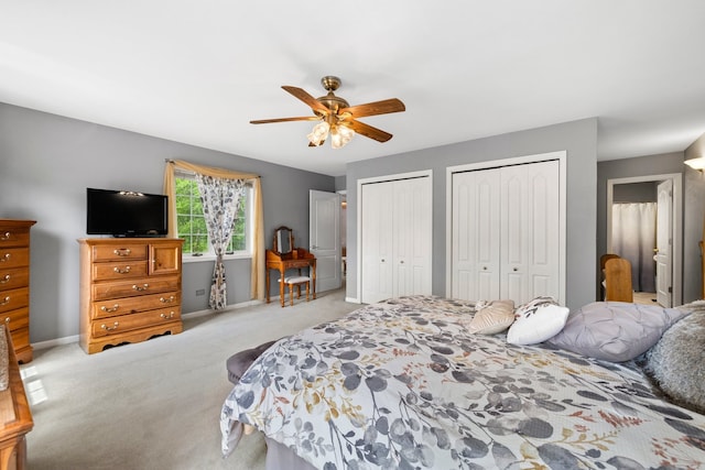 700 Monroe Dr, Lindenhurst, IL 60046 - carpeted bedroom with multiple closets and a ceiling fan
