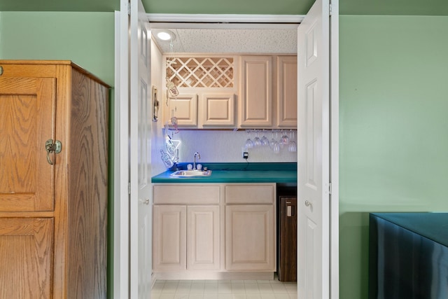 700 Monroe Dr, Lindenhurst, IL 60046 - indoor wet bar featuring light tile patterned floors