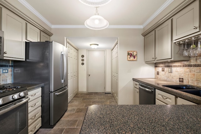 700 Monroe Dr, Lindenhurst, IL 60046 - kitchen featuring appliances with stainless steel finishes, dark countertops, stone finish flooring, and ornamental molding