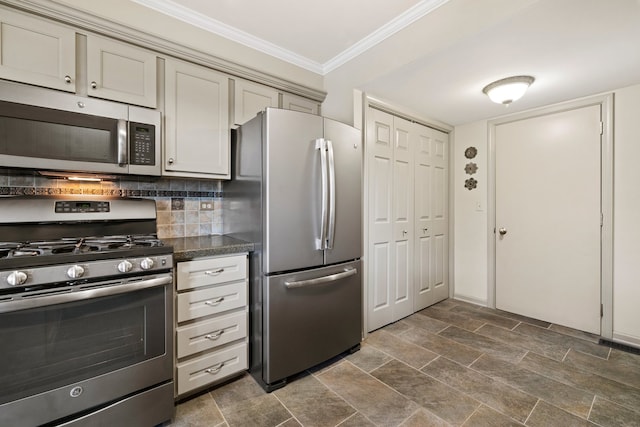 700 Monroe Dr, Lindenhurst, IL 60046 - kitchen featuring appliances with stainless steel finishes, dark countertops, crown molding, and tasteful backsplash