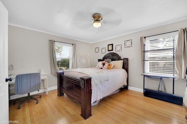 25 E 150th St, Harvey, IL 60426 - bedroom with light wood-style floors, crown molding, and ceiling fan