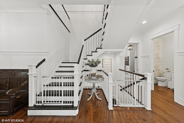 4603 Oakwood Ave, Downers Grove, IL 60515 - stairway featuring wood finished floors, a decorative wall, crown molding, and recessed lighting