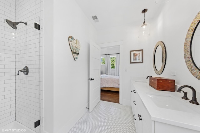 4603 Oakwood Ave, Downers Grove, IL 60515 - bathroom featuring double vanity, tiled shower, and ensuite bath
