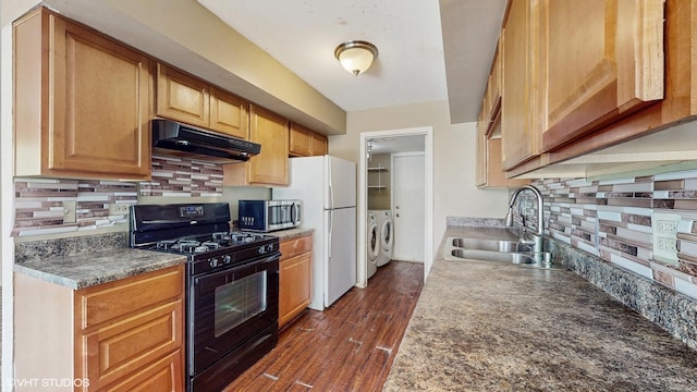9221 Auburn Ct, Orland Park, IL 60462 - kitchen featuring black gas range, under cabinet range hood, stainless steel microwave, separate washer and dryer, and freestanding refrigerator