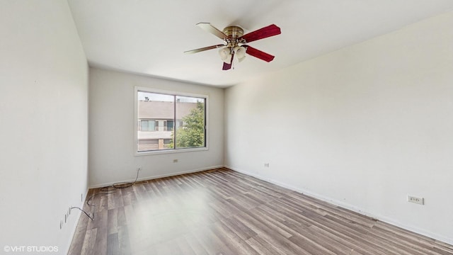9221 Auburn Ct, Orland Park, IL 60462 - empty room with light wood-style floors and a ceiling fan