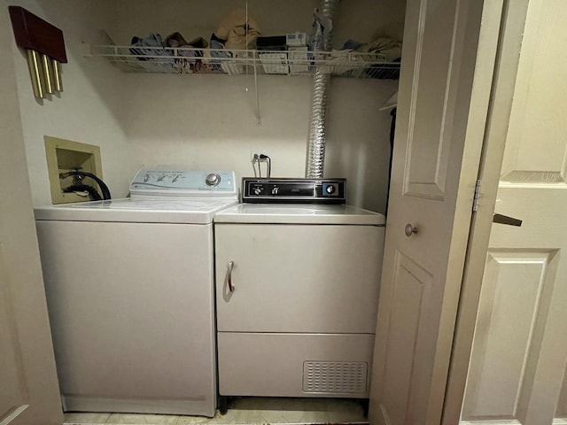 1027 W Vernon Park Pl Unit B, Chicago, IL 60607 - washroom with washer and dryer