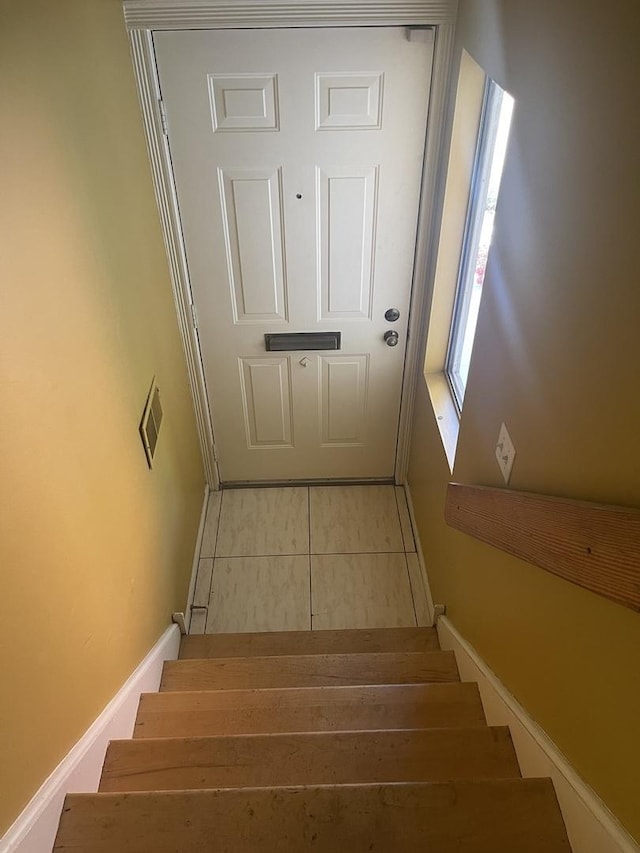 1027 W Vernon Park Pl Unit B, Chicago, IL 60607 - stairway with tile patterned flooring and baseboards