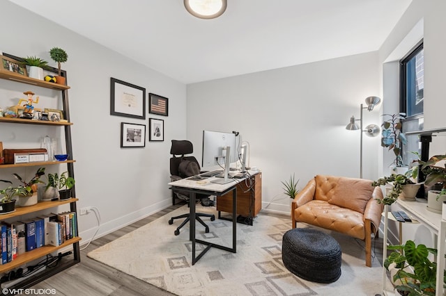 1018 N Larrabee St Unit 5S, Chicago, IL 60610 - home office featuring light wood-style floors and baseboards
