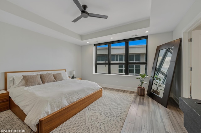 1018 N Larrabee St Unit 5S, Chicago, IL 60610 - bedroom featuring recessed lighting, light wood finished floors, multiple windows, and a ceiling fan