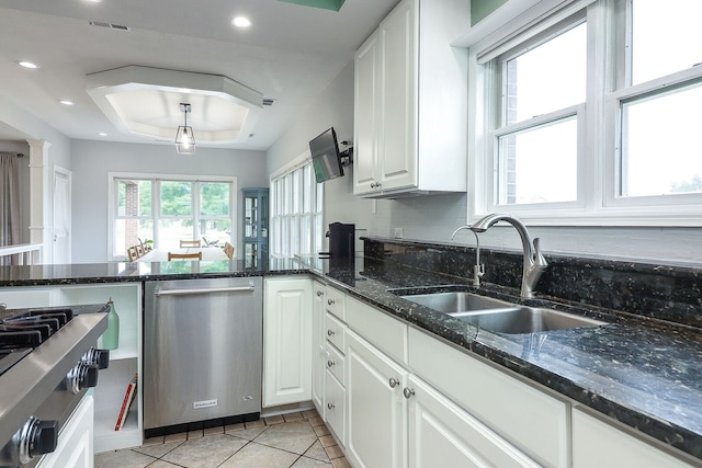 15442 W Purley Ct, Homer Glen, IL 60491 - kitchen with appliances with stainless steel finishes, a raised ceiling, white cabinets, and recessed lighting