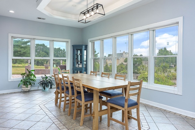15442 W Purley Ct, Homer Glen, IL 60491 - dining space with inlaid floor details, a raised ceiling, light tile patterned flooring, recessed lighting, and a chandelier