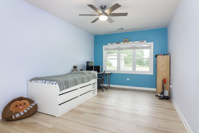 15442 W Purley Ct, Homer Glen, IL 60491 - bedroom with wood finished floors, a desk, and a ceiling fan