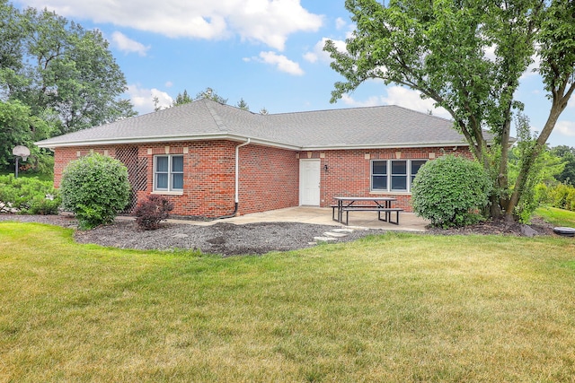 15442 W Purley Ct, Homer Glen, IL 60491 - rear view of house with brick siding, a patio area, and a lawn