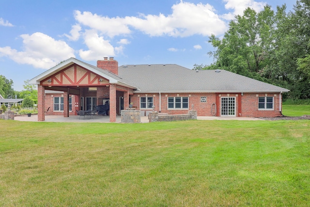 15442 W Purley Ct, Homer Glen, IL 60491 - back of house featuring a patio area, brick siding, and a lawn